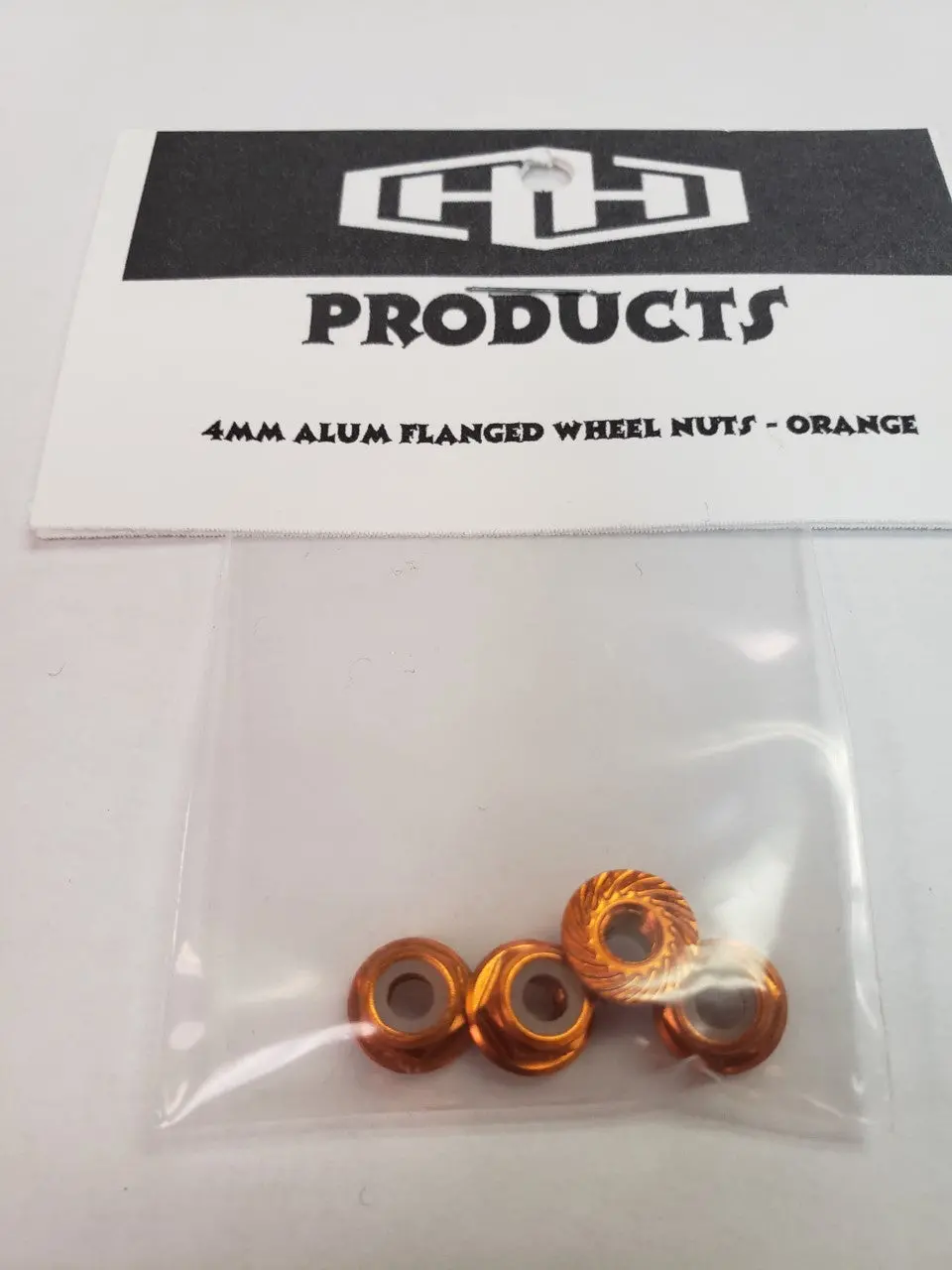 Hamilton Hobbies 4Mm Flanged Nylon Locking Nut (Aluminum, Orange-Anodized, Serrated) (4)  (Ham5491o) 1