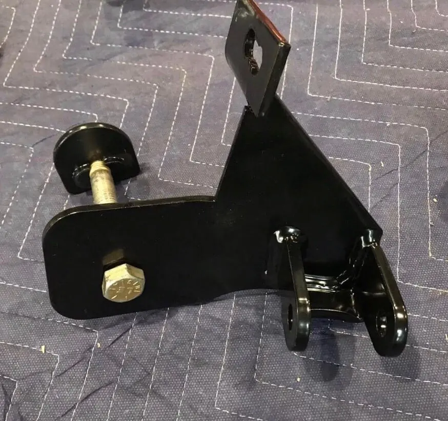 03-13 Ram Lower External Shock Mounts Front Axle 1